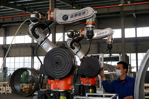 位于海门辖区内的南通梦工厂家具有限公司振康机械签订机器人购买协议